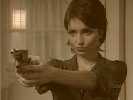 Not finding her big shiny gun in the prop department, Sosnovska uses this wimpy replacement