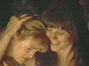 Stop laughing--this is a CAMPFIRE scene.  We're supposed to look all gooey-eyed and stuff.