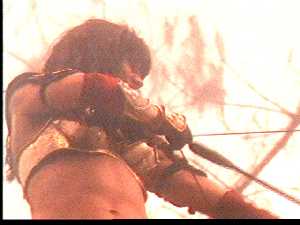 Xena's arrow is thwarted when her foes instead die from laughing at her costume choice.